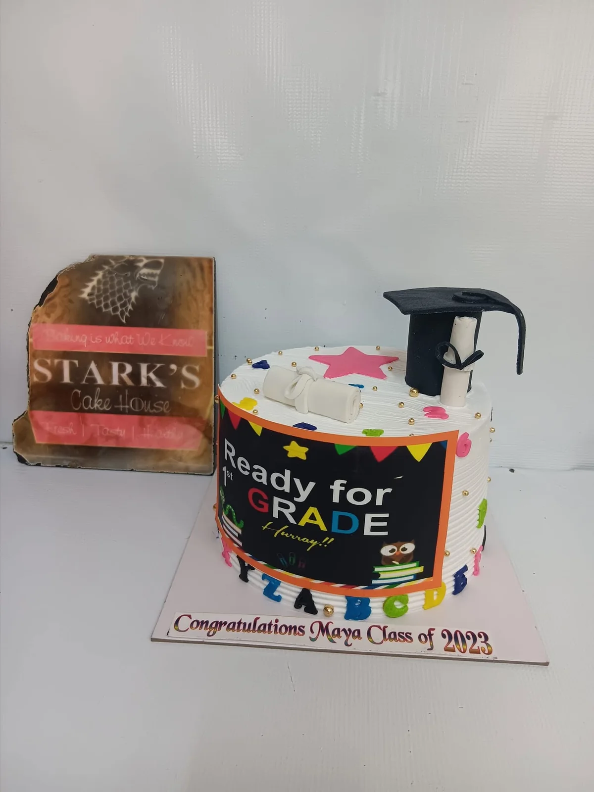 Blue graduation celebration cake by Stark’s Cake House in Turkana
